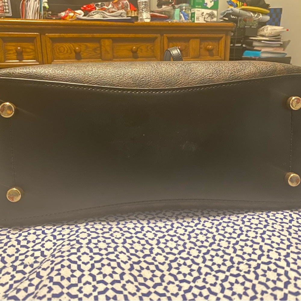 Brown and black coach tot bag